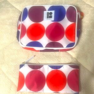 Estee Lauder Lisa Perry makeup bags.  White back round with multi color circles